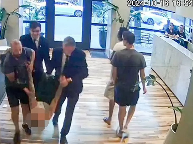 New Liam Payne CCTV footage emerges of the singer being carried through the lobby of his Argentinian hotel before his death. Picture: via the New York Post