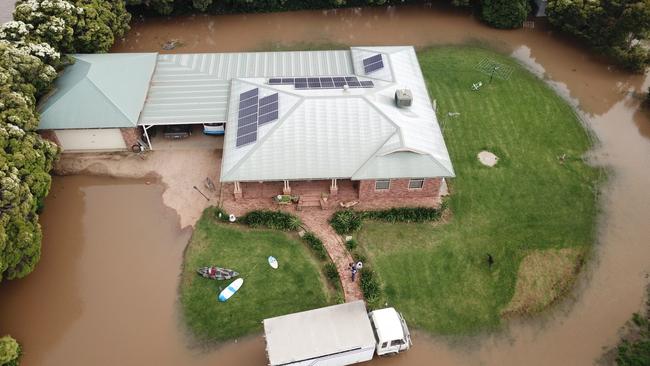 An aerial shot of Gary Tomlinson's home, as floodwaters inch closer to the Forbes property. Picture: Supplied