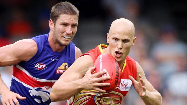 09/04/2011 SPORT: Western Bulldogs v Gold Coast Suns. Etihad Stadium. Gary Ablett Jr bursts out of the middle