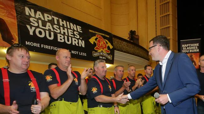 Daniel Andrews campaigning with fire fighters at the Collingwood Town Hall in 2014. Picture: Hamish Blair