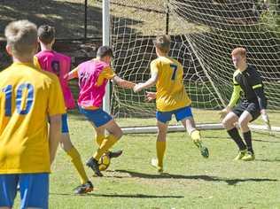 CUP CLASH: Toowoomba Grammar School's Bill Turner Cup team gets  in a contested training session ahead of their national semi-final match against  Bossley Park High School today. Picture: Nev Madsen