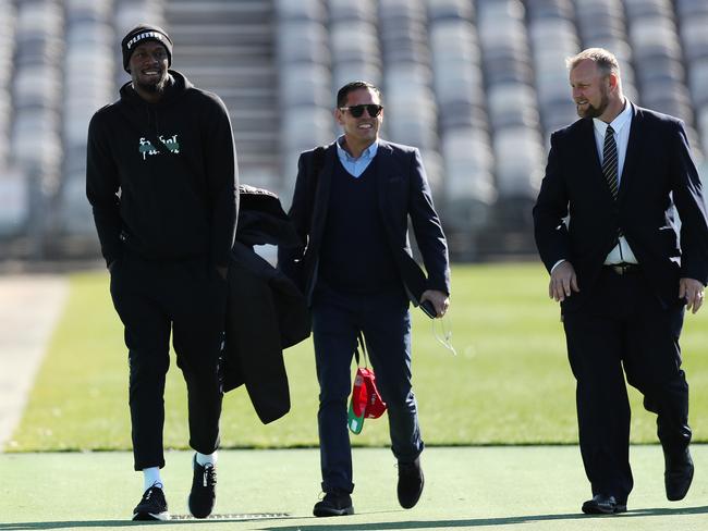 Usain Bolt arrives for his first training session with manager Ricky Sims and Central Coast Mariners CEO Shaun Mielekamp at Central Coast Stadium. Picture: Brett Costello