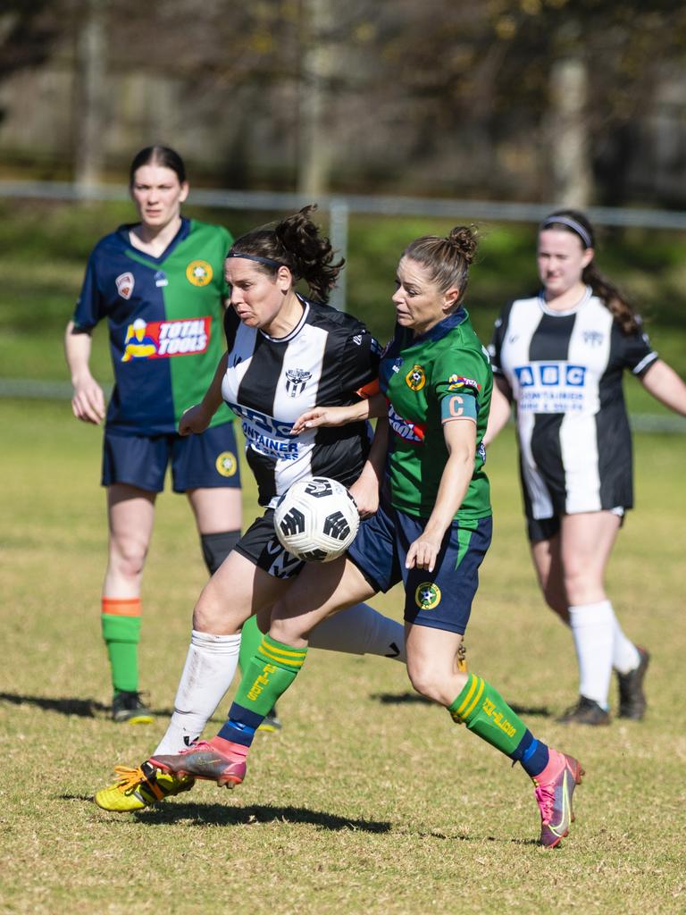 Kiama Gray (left) of Willowburn and Shannon Tyrrell of Highfields in FQPL Women Darling Downs Presidents Cup football at West Wanderers, Sunday, July 24, 2022. Picture: Kevin Farmer