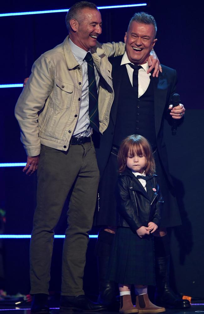 Anthony Field of The Wiggles presents Jimmy Barnes and his grandson Dylan with the ARIA Award for Best Children's Album. Picture: AAP Image/David Moir