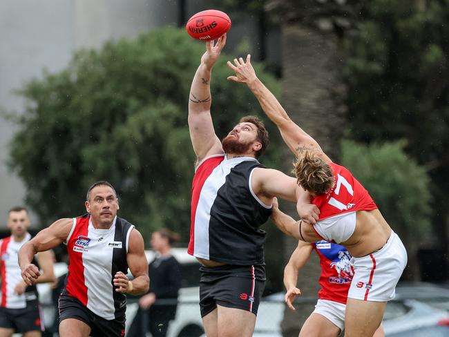 St Kilda v Port Melbourne Colts at Peanut Farm Reserve, St Kilda, Melbourne, April 15th 2023.  St Kilda City no 92 rucks against Port Melbourne Colts D Kovacevic. Picture : George Sal