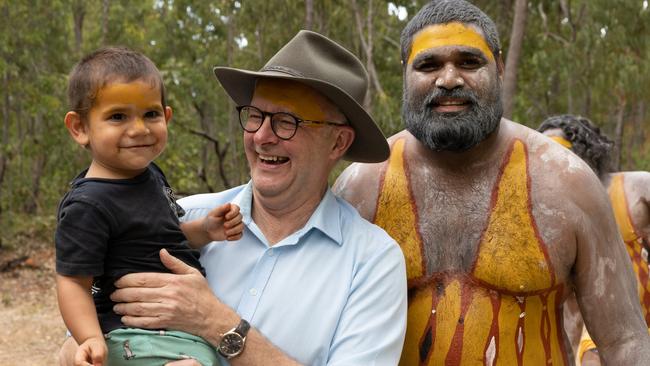 Australian Prime Minister Anthony Albanese interacts with a child during the Garma Festival. Picture: Tamati Smith/ Getty Images