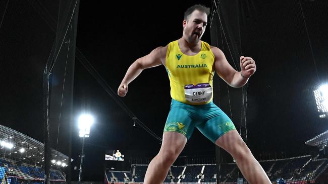 Australia's Matthew Denny celebrates winning the men's discus