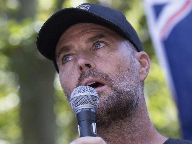 SYDNEY, AUSTRALIA - FEBRUARY 20: Pete Evans is seen at an anti-vaccination rally at Hyde Park on February 20, 2021 in Sydney, Australia. Evans is a controversial celebrity chef and conspiracy theorist who was recently banned fromÃÂ InstagramÃÂ and Facebook for sharing misinformation about the coronavirus and vaccines. The protestors are demonstrating against mandatory COVID-19 vaccines. The COVID-19 vaccine is due to be rolled out to frontline health workers across Australia from next week. The Australian government has purchased enough vaccines for all Australians to be vaccinated, should they choose to do so. While vaccinations are not mandatory, some industries might require workers to get the COVID-19 vaccine as a condition of employment. (Photo by Brook Mitchell/Getty Images)