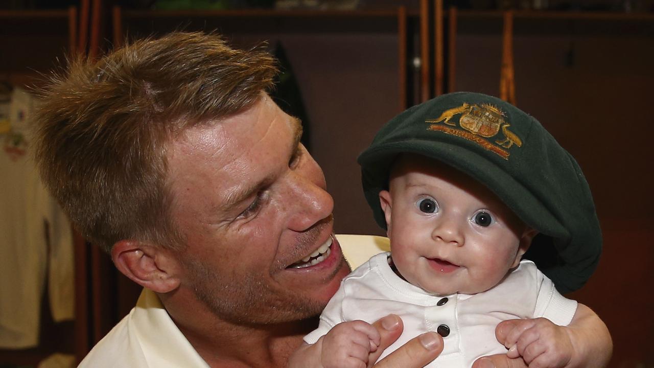 Warner and his daughter Ivy with the baggy green. Picture: Ryan Pierse – CA/Cricket Australia via Getty Images