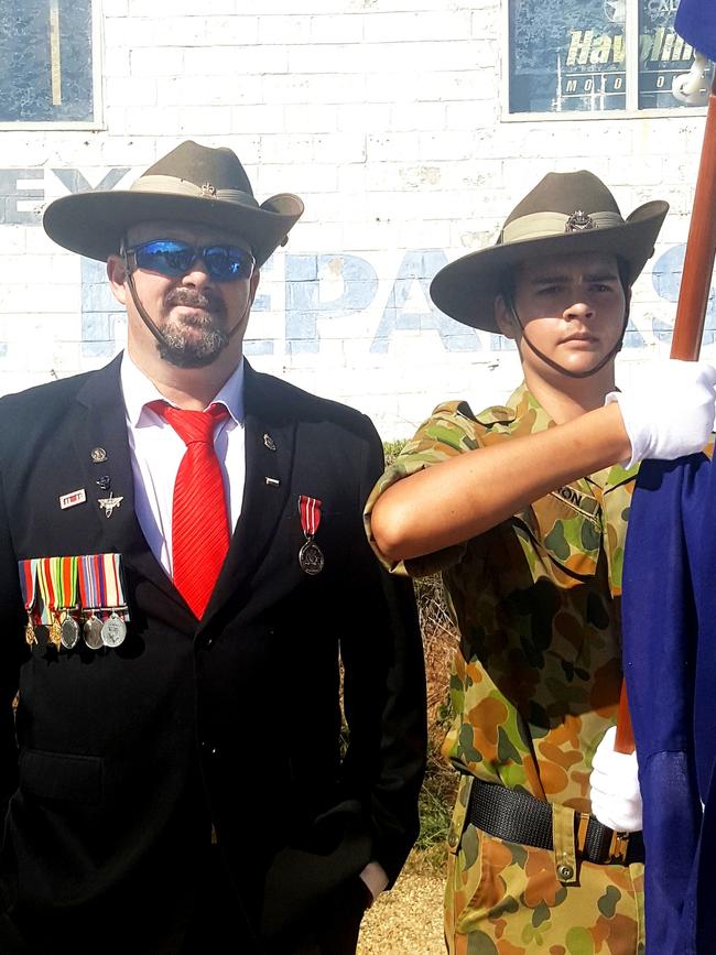 Michael Cameron with his son Eli, 15, on Anzac Day this year.