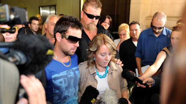 Christopher Rowe, centre, and his relatives outside court after reading their victim impact statements in front of Kapunda triple murderer Jason Alexander Downie.