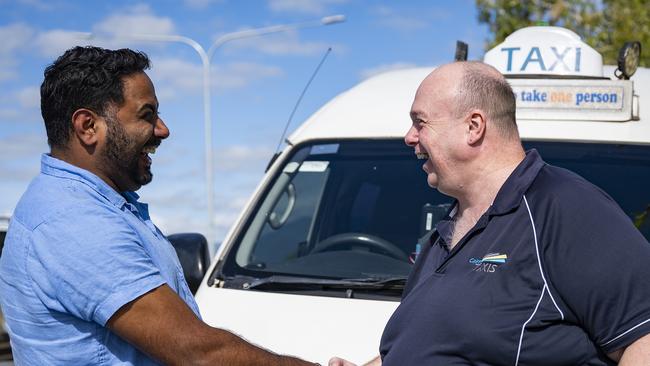 Harvir Hundal with Cairns Taxis fleet service manager Chris Balsom. Picture Emily Barker