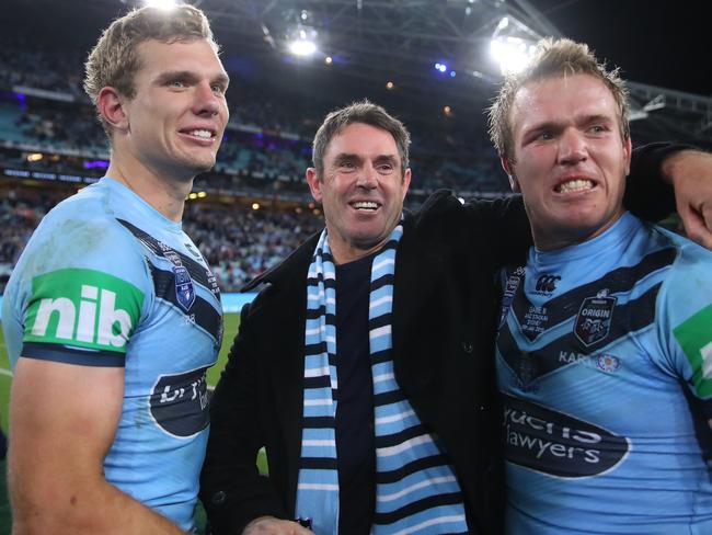 SYDNEY, AUSTRALIA - JULY 10:  Blues coach Brad Fittler celebrates with Tom Trbojevic of the Blues and Jake Trbojevic of the Blues after winning game three of the 2019 State of Origin series between the New South Wales Blues and the Queensland Maroons at ANZ Stadium on July 10, 2019 in Sydney, Australia. (Photo by Cameron Spencer/Getty Images)