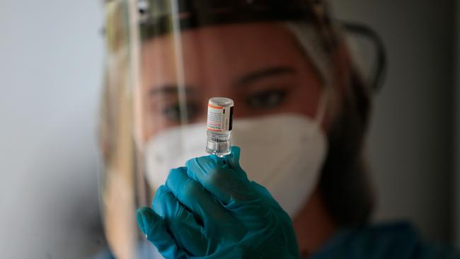 A nurse prepares a dose of the Pfizer paediatric vaccine. Picture: Rogelio Figueroa/AFP