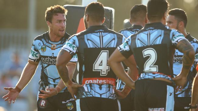 James Maloney of the Sharks gives instruction to his players.