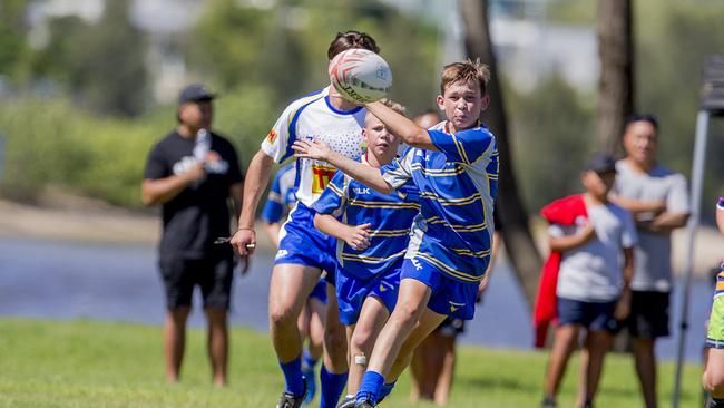 Day One of King of the Country rugby tournament at James Overell Park, Southport. possible. Sunshine Coast Invitational Barbarians U13s (Blue/yellow) v USQ Saints U13s (with ball). Picture: Jerad Williams