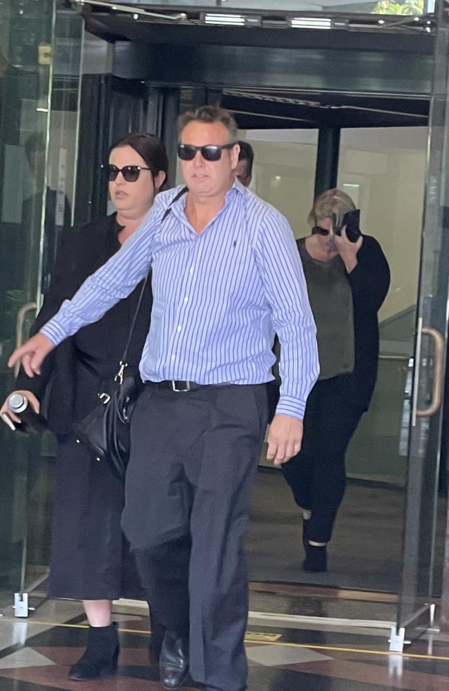 Helen Jacobs (front) leaves Downing Centre Local Court with Berry Patch director Melinda Brown (back) on Wednesday. Ms Brown testified but was not charged and is not accused of any wrongdoing.