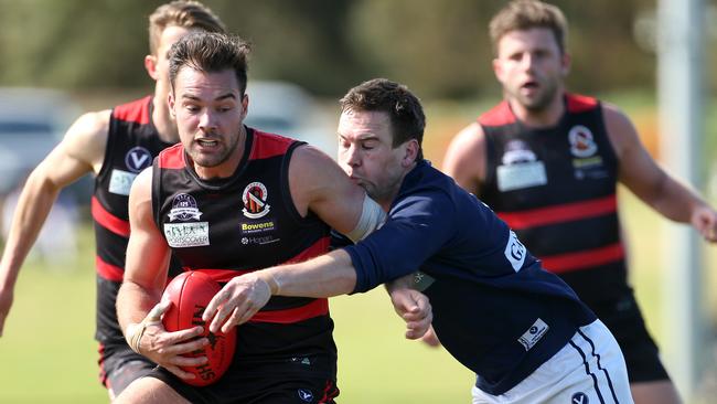 Tom Amad of Old Xaverians football club (left) during the 2018 VAFA Reserves grand final. Picture: Hamish Blair