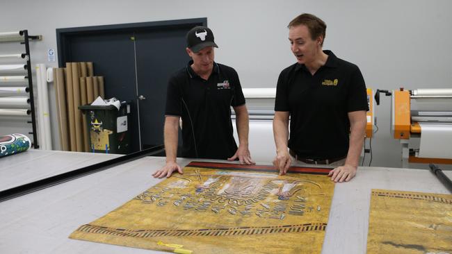 Inspired Signs managing director Adam Simes and Tomb of the Pharaohs chief executive and founder Daniel Leipnik. Picture: Molly Frew