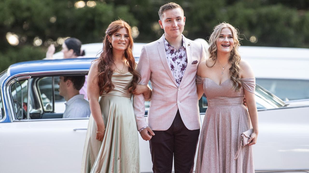 Arwen Elder, Wyatt Myers and Tara Abbott. Toowoomba State High School formal at Picnic Point. Friday, September 9, 2022. Picture: Nev Madsen.