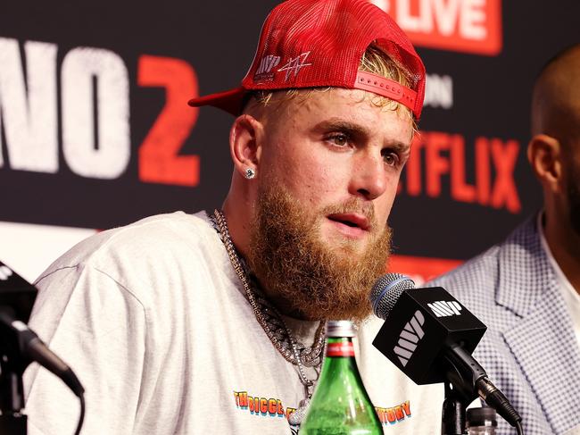 ARLINGTON, TEXAS - NOVEMBER 15: (L-R) Jake Paul and Michael Rubin speak during the post match press conference for LIVE On Netflix: Jake Paul vs. Mike Tyson at AT&T Stadium on November 15, 2024 in Arlington, Texas. (Photo by Sarah Stier/Getty Images for Netflix Ã&#130;Â© 2024)