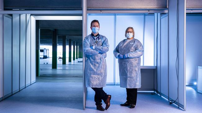 Sunshine hospital unit managers Donald Johnson and Kylie Roper in the COVID-19 vaccine hub being constructed in the carpark at Sunshine Hospital. Picture: Aaron Francis