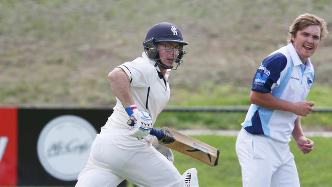 Lewy Hyland picks up a run off Jan Juc bowler Nicky Smith. Picture: Mark Wilson