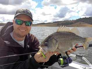 Matthew Osley with a quality Somerset Dam bass caught on a Keitech Plastic.