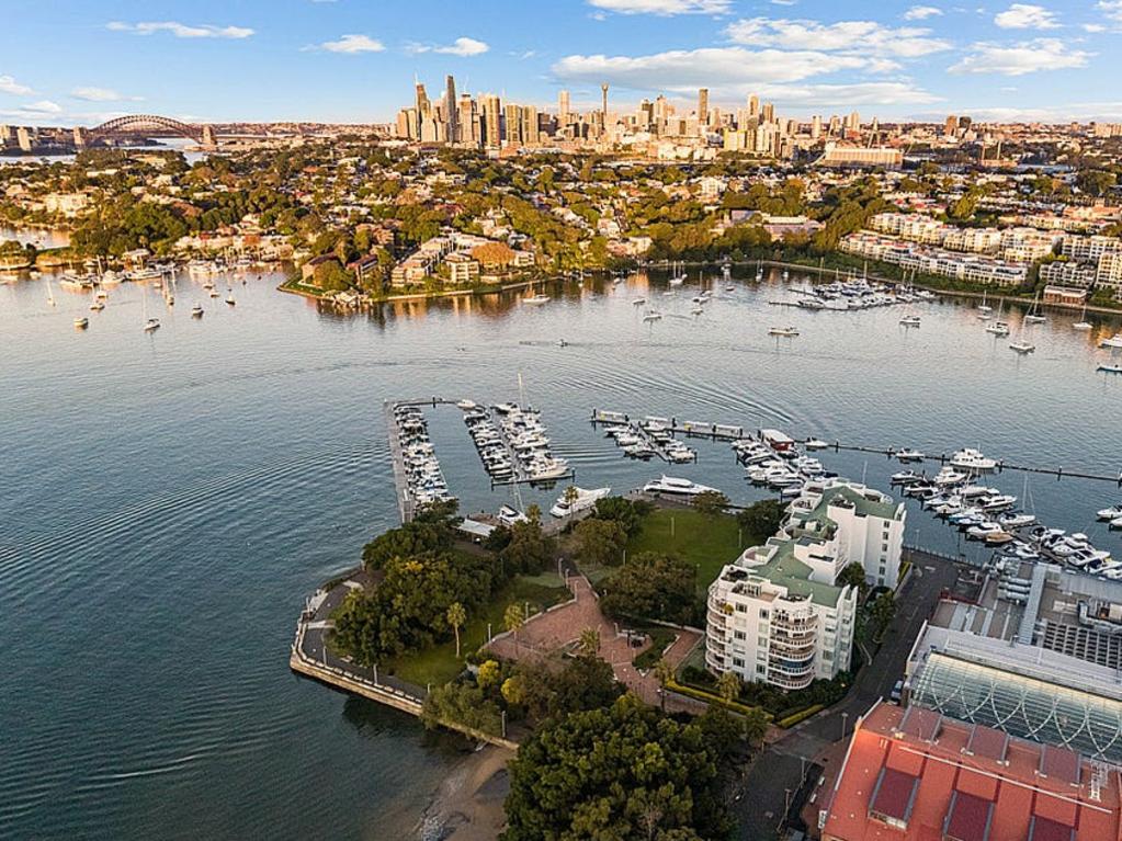 The sixth-level apartment, with two bedrooms and two bathrooms, is wrapped in a large balcony with views across the harbour.