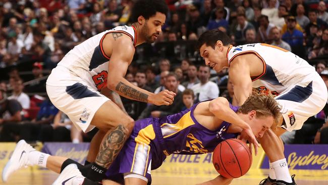 SYDNEY, AUSTRALIA — OCTOBER 28: Kyle Adnam of the Kings competes for the ball during the round three NBL match between the Sydney Kings and the Cairns Taipans at Qudos Bank Arena on October 28, 2018 in Sydney, Australia. (Photo by Mark Metcalfe/Getty Images)