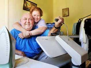 Lismore resident Barry Ford gets a hug from his wife, Lisa, as he willingly attends to the ironing. . Picture: Jacklyn Wagner