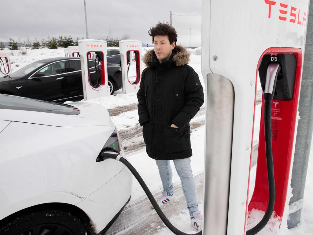 Tesla owner Philip Benassi at a charging station in Norway. Picture: Petter Berntsen/AFP