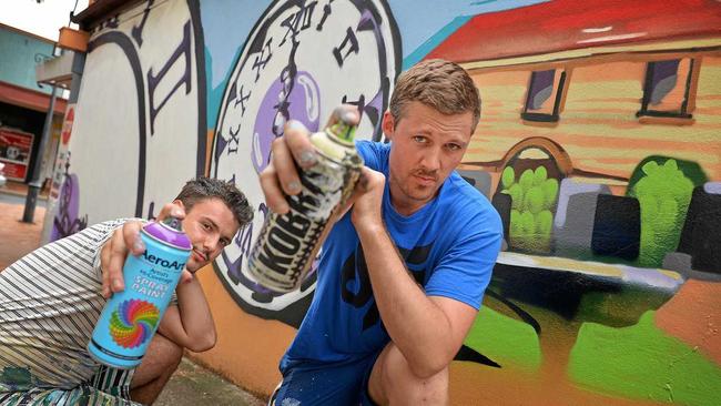 FROM BLAND TO GRAND: James Ellis and Jesse Jensen are brining the artistic flair of street art to Gympie.. Picture: Renee Albrecht