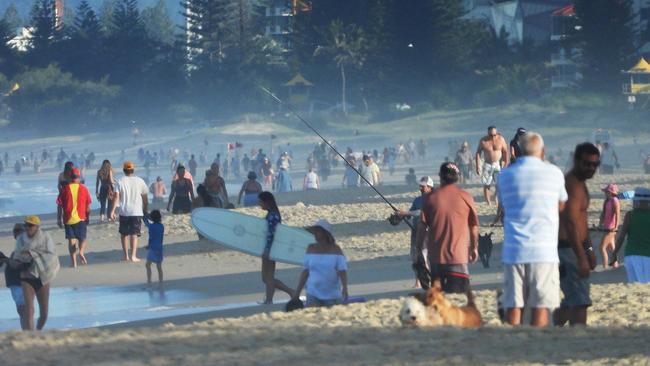 20/04/2020 : Lifes a beach as thousands 'exercise' on Gold Coast beaches on Monday. Picture: Lyndon Mechielsen/The Australia