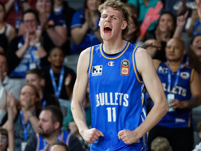 Rocco Zikarsky celebrates during the round two NBL match between Brisbane Bullets and Cairns Taipans at Nissan Arena. Photo: Russell Freeman/Getty Images.