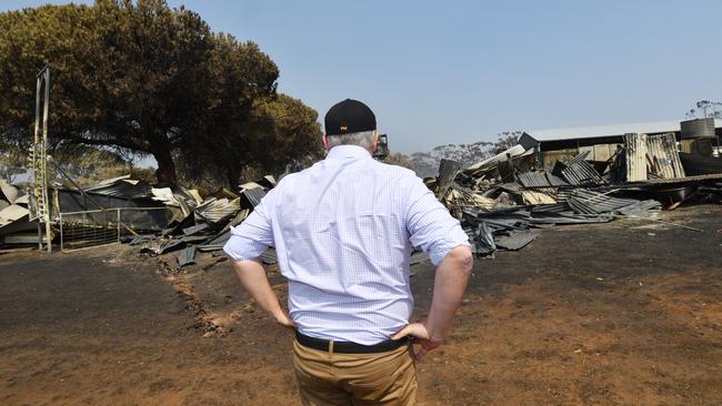 Prime Minister Scott Morrison surveys fire-damaged property at Stokes Bay, Kangaroo Island. Picture: AAP