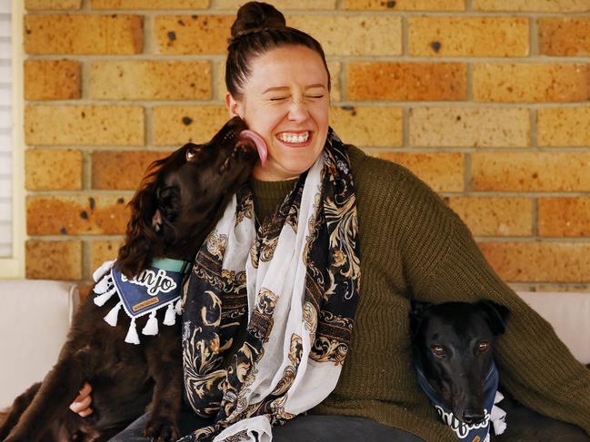 WEEKEND  TELEGRAPHS - 7/1/23  MUST CHECK WITH PIC EDITOR JEFF DARMANIN BEFORE PUBLISHING  -Kirsten Duffy and her dogs Rufus the greyhound and Banjo the Spoodle pictured at her home in St Clair today. Picture: Sam Ruttyn