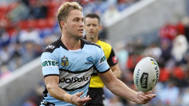 Matt Moylan passes the ball for the Sharks. Picture: AAP