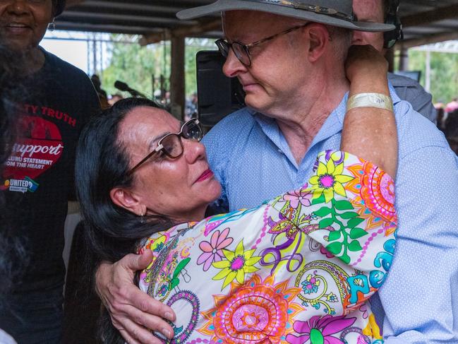 Linda Burney embraces Prime Minister Anthony Albanese during the Garma Festival at Gulkula in 2022. Picture: Tamati Smith/Getty Images