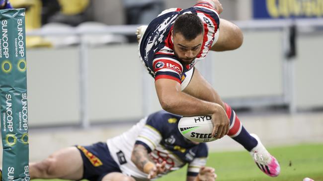 Roosters winger Matt Ikuvalu had a night out against the Cowboys, scoring five tries.