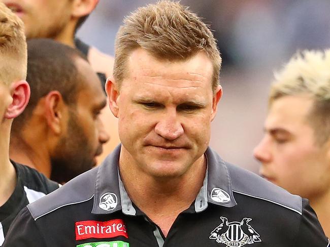 MELBOURNE, AUSTRALIA - JULY 08:  Nathan Buckley, coach of the Magpies speaks to his team during a quarter time break during the round 16 AFL match between the Collingwood Magpies and the Essendon Bombers at Melbourne Cricket Ground on July 8, 2017 in Melbourne, Australia.  (Photo by Scott Barbour/Getty Images)