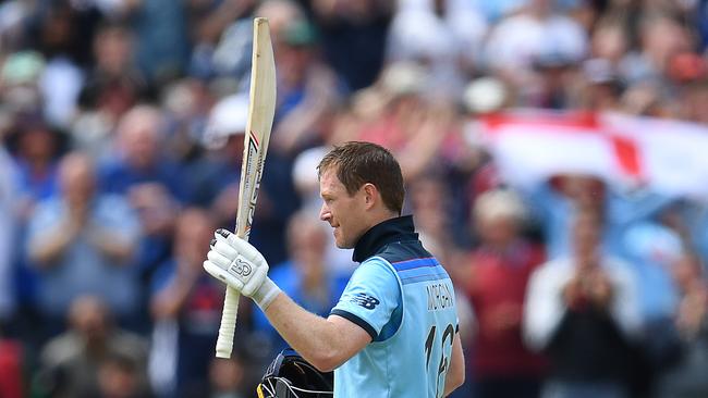 Eoin Morgan celebrates bringing up his century. Picture: Getty Images