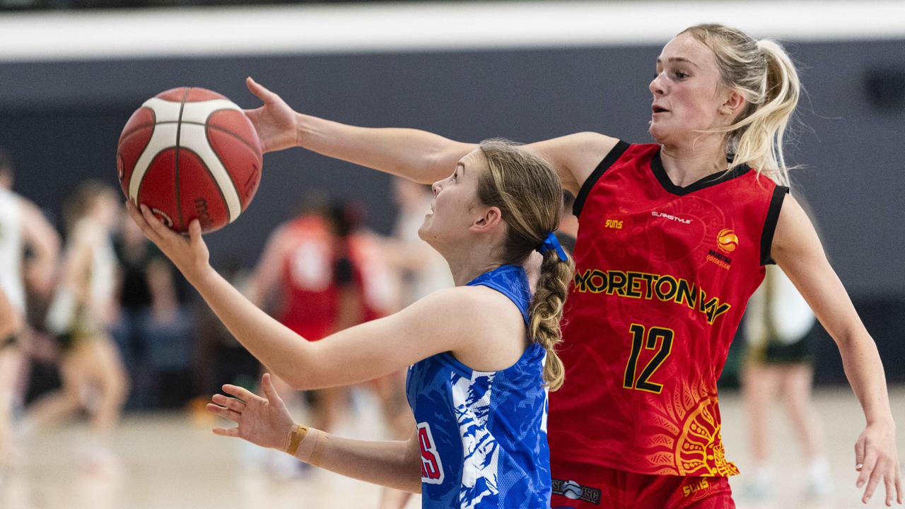 Samantha Hunter (left) of Toowoomba Mountaineers and Jessa Lowe-Barnsdale of Moreton Bay Suns in SQJBC U18 Women round 3 basketball at Toowoomba Grammar School, Sunday, October 20, 2024. Picture: Kevin Farmer