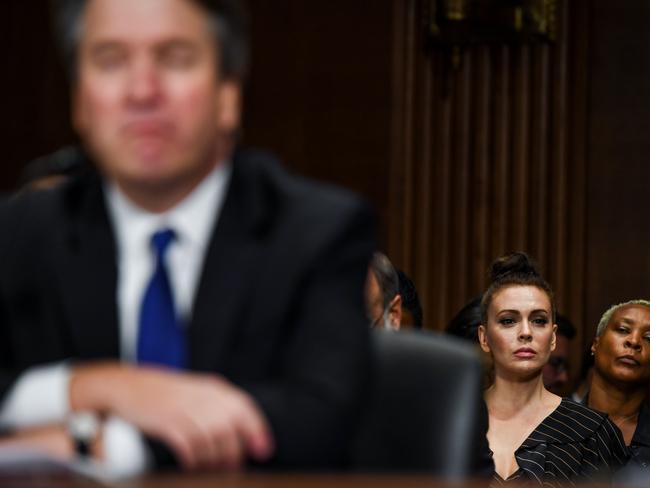 Actor Alyssa Milano (R) looks on as Judge Brett M. Kavanaugh testifies in front of the Senate Judiciary committee. Picture: AFP