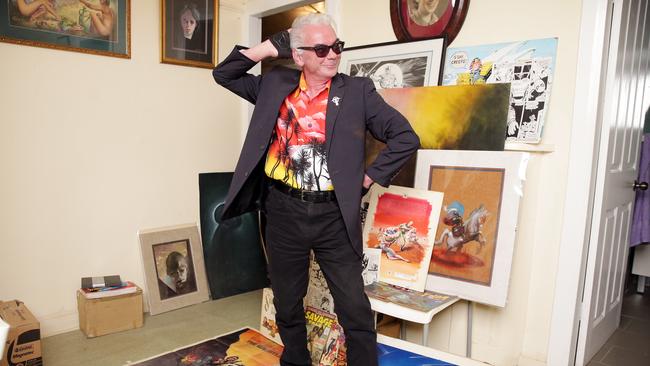 Richard Rae amid his art collection in his humble Cabramatta home. Picture: Christian Gilles