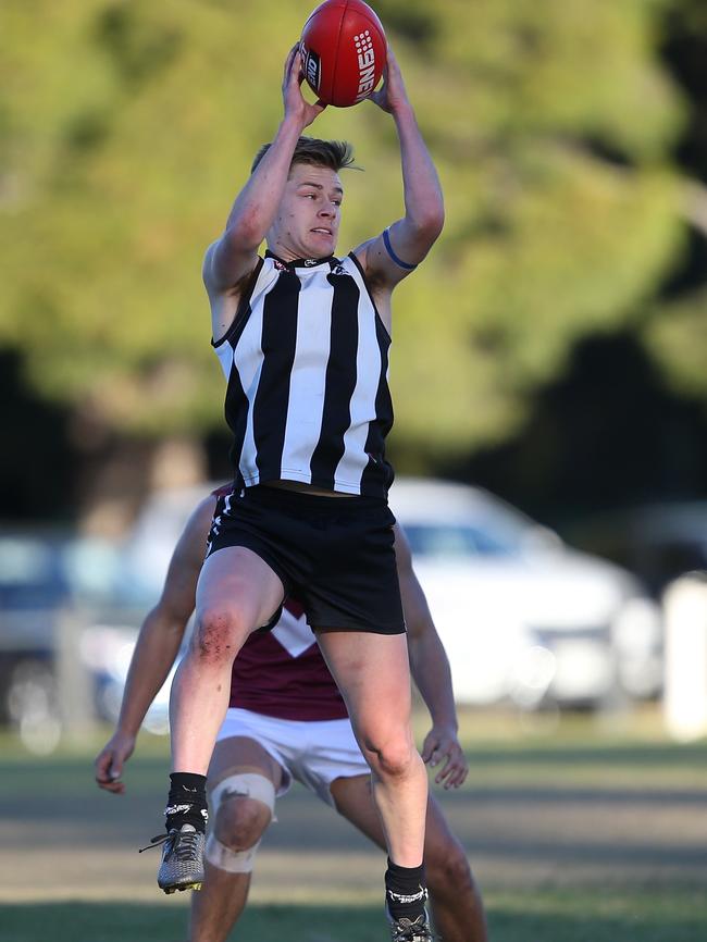 Salisbury Jack Matthews marks against Colonel Light Gardens on Saturday, July 1, 2017 (AAP Image/James Elsby)