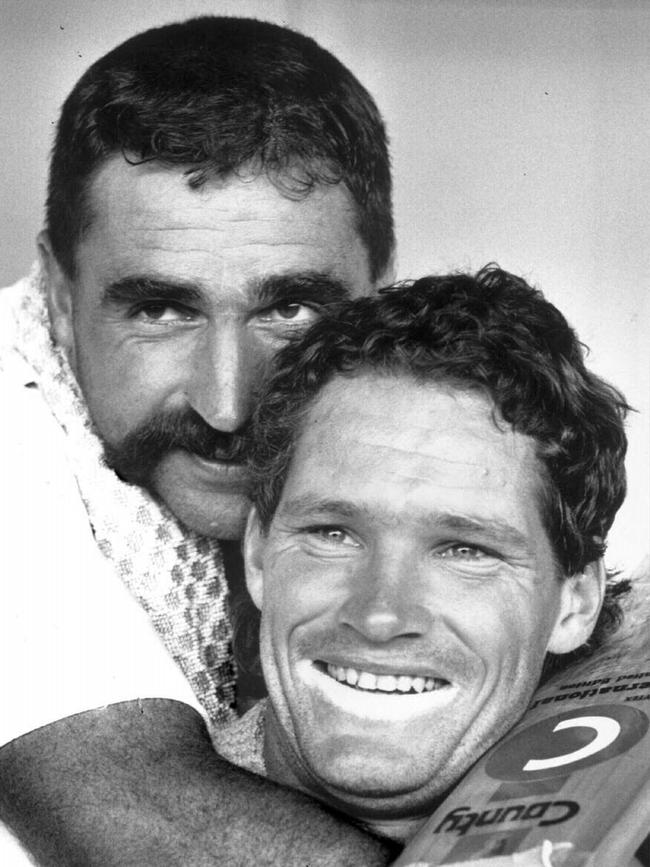 Australian Test cricketers Merv Hughes and Dean Jones relax after a huge partnership in the fifth Test at Adelaide Oval against the West Indies in 1989. Jones made 216 and Hughes 72 not out.