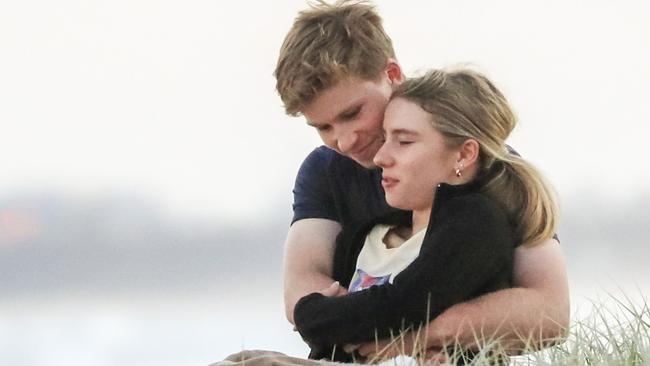 Robert and Rorie looked relaxed and cosy as they shared a meal on the beach. Picture: Media Mode