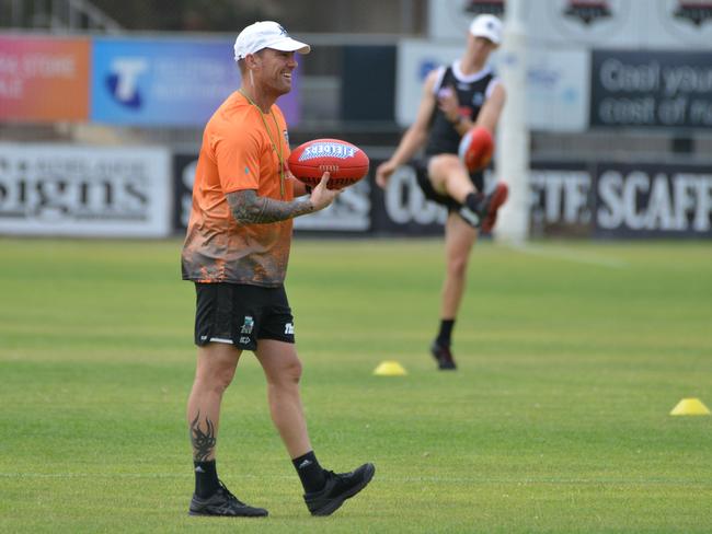 First-year Power assistant Jarrad Schofield has had a big influence on Karl Amon’s improved form. Picture: AAP/Brenton Edwards