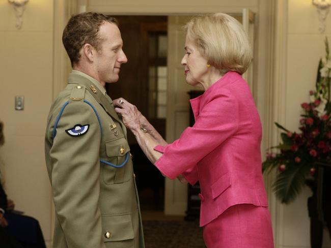 Then Governor-General Dame Quentin Bryce awards Mark Donaldson Australia’s highest military honour — The Victoria Cross — in 2009.